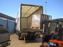 USDA-NRCS materials being lifted into the van